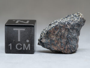 d'Orbigny (angrite) - 1.98g fragment crusted