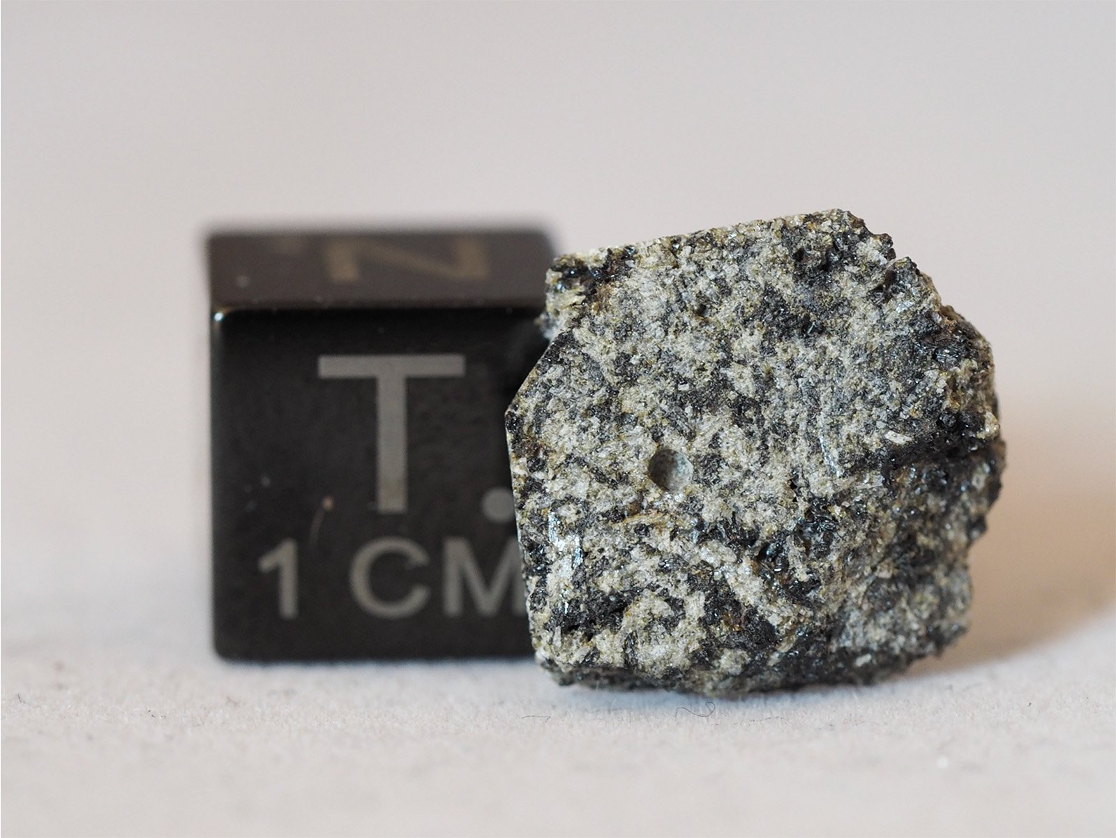 D'Orbigny (angrite) - 1.236g part slice